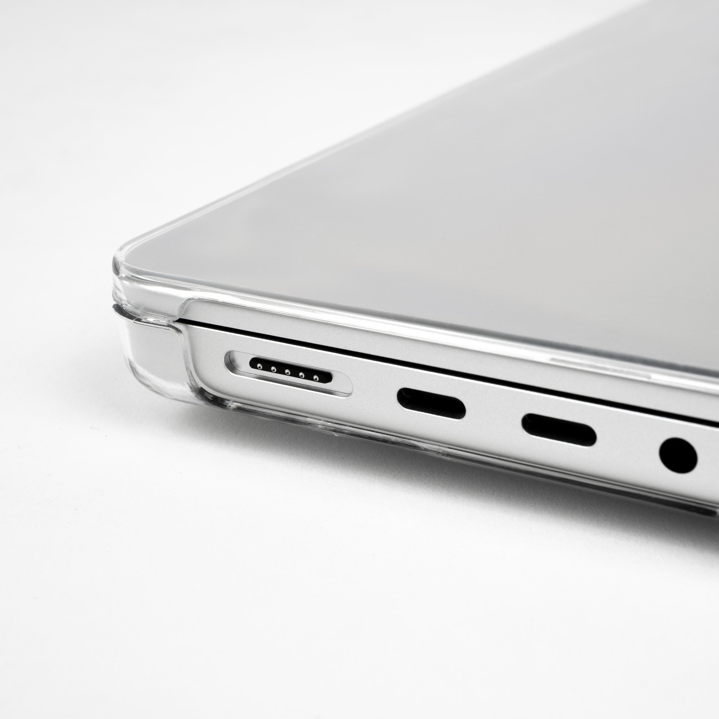 Macro view of Humley clear case cutouts on 14-inch MacBook Pro ports