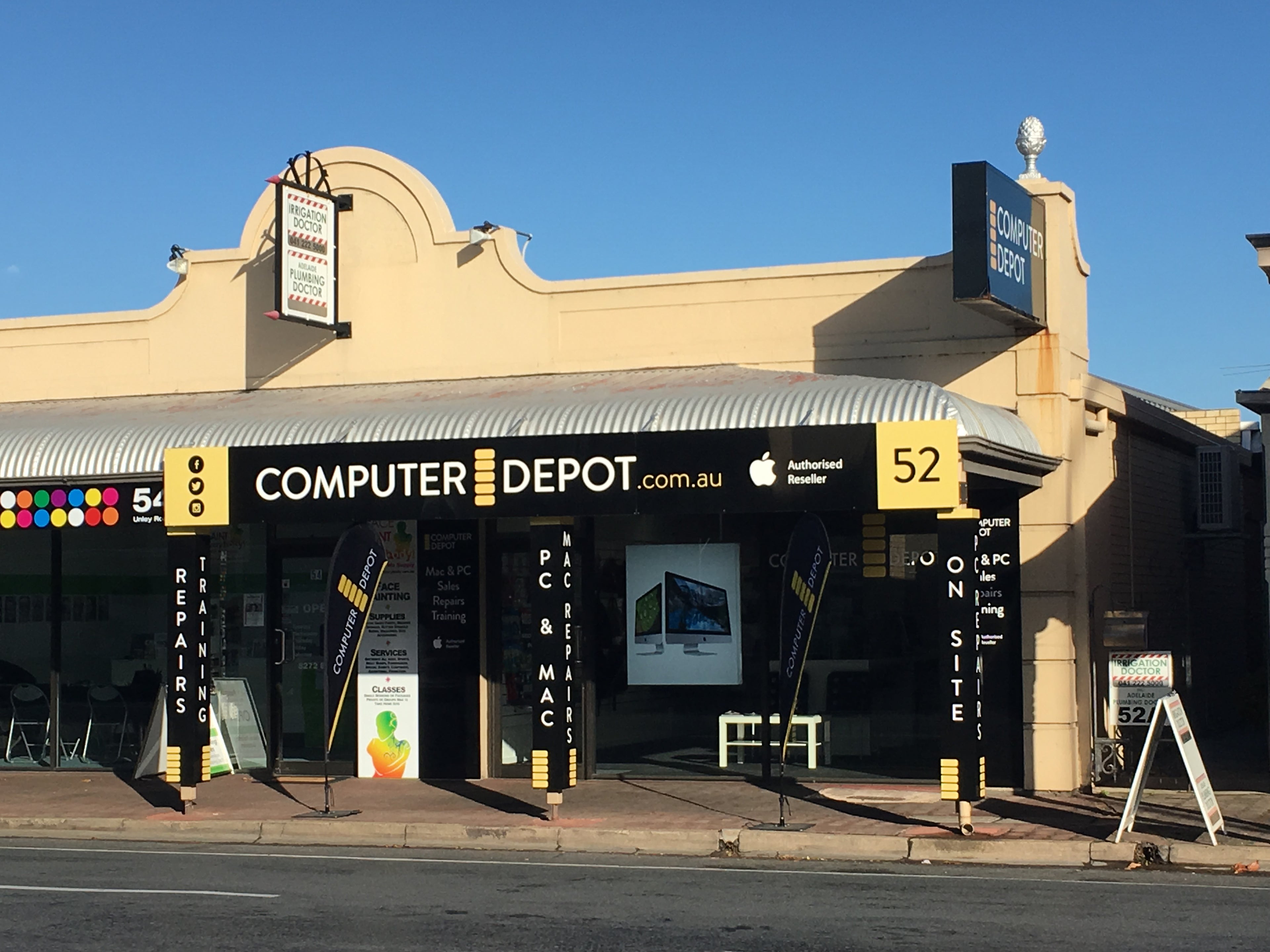 Computer Depot storefront with Apple Authorized Reseller signage