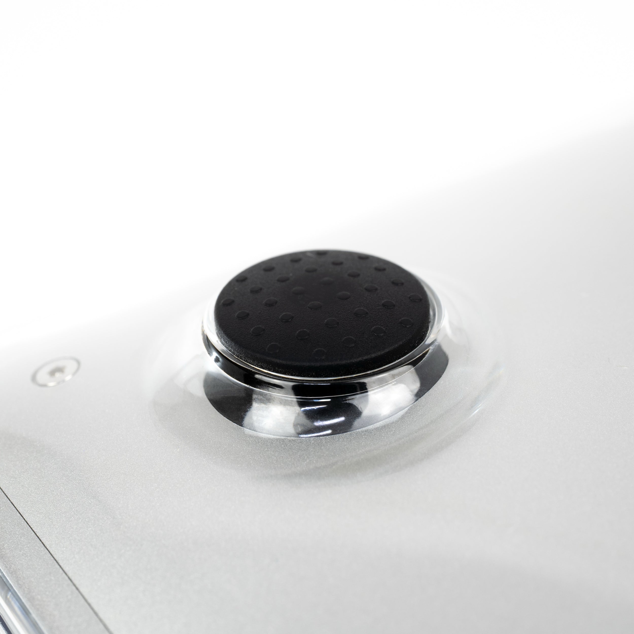 Close-up of black rubber non-slip feet on Humley clear MacBook case