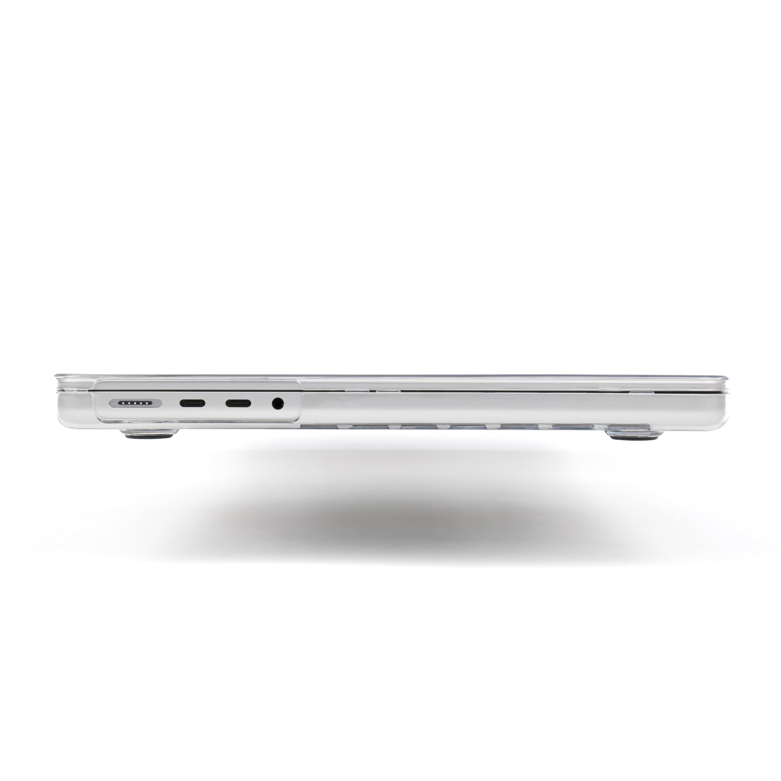 Side view of MacBook Pro 14-inch with Humley clear hard case showing precise port cutouts including MagSafe, USB-C, and headphone jack