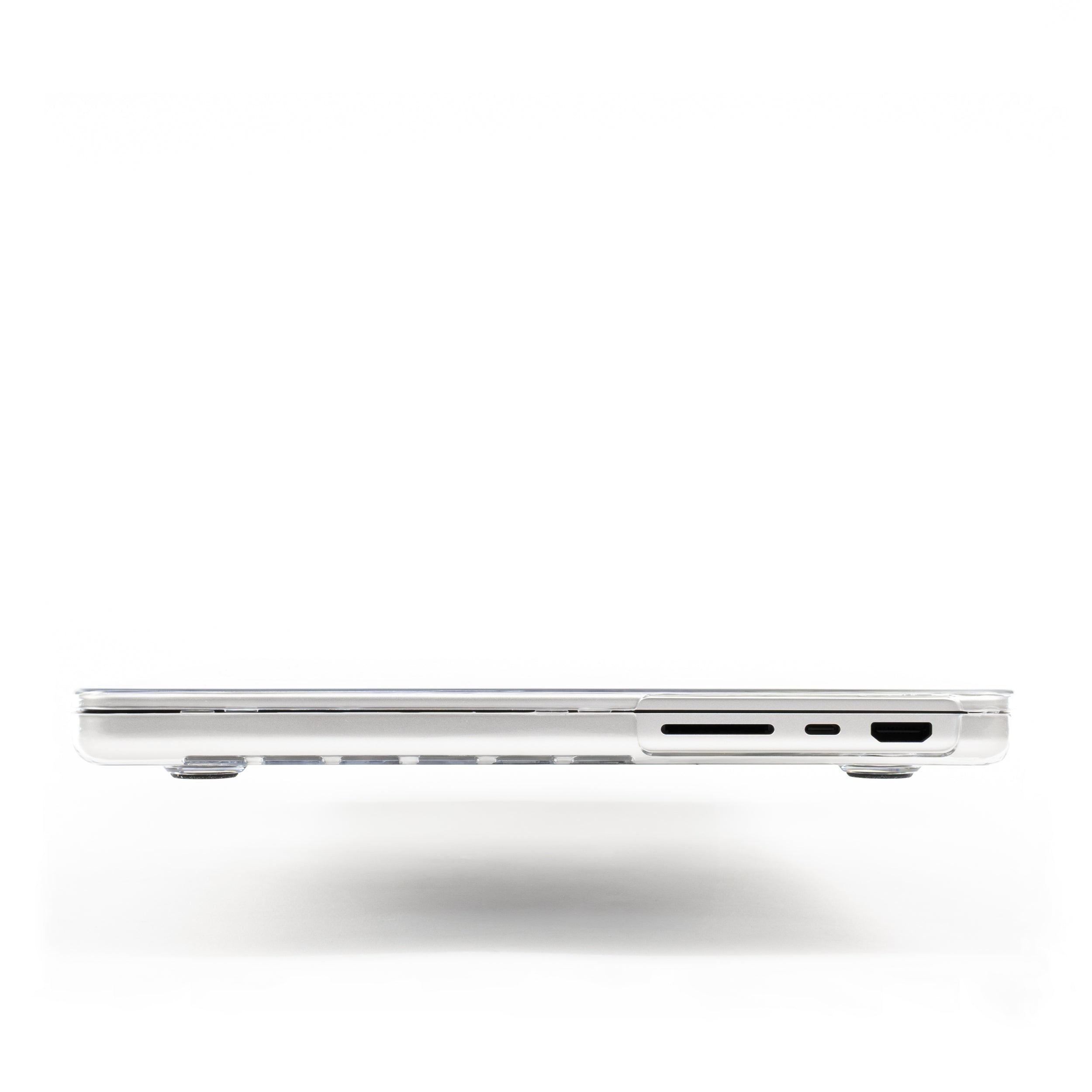 Side view of MacBook with Humley clear hard case showing precise port cutouts and slim fit